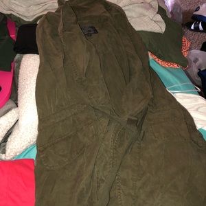 Green sleeveless jacket